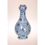 A CHINESE BLUE AND WHITE PORCELAIN VASE, of baluster form, with "garlic" neck,