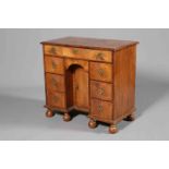 A WILLIAM & MARY STYLE WALNUT KNEEHOLE DESK,