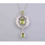 AN EDWARDIAN PERIDOT AND DIAMOND PENDANT,