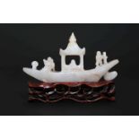 A CHINESE CARVED JADE MODEL OF A RIVER BOAT, the stone grey/white,