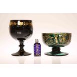 A 19th CENTURY GILT-DECORATED AMETHYST GLASS GOBLET,