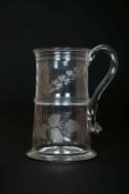 AN ENGRAVED GLASS TANKARD, LATE 18th CENTURY, of tapering cylindrical form,