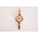 A ROLEX 9 CARAT GOLD LADY'S WRISTWATCH, import mark for 1916, circular case,