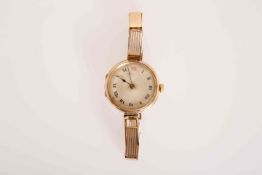 A ROLEX 9 CARAT GOLD LADY'S WRISTWATCH, import mark for 1916, circular case,