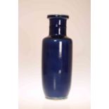 A CHINESE BLUE GLAZED PORCELAIN ROULEAU VASE OF KANGXI TYPE, of characteristic form,