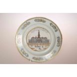 A CHINESE EXPORT PLATE, painted to the well with a palace and figures within a gilt rim border,