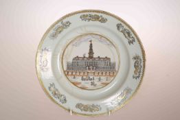 A CHINESE EXPORT PLATE, painted to the well with a palace and figures within a gilt rim border,