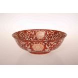 A CHINESE IRON RED REVERSE DECORATED BOWL,