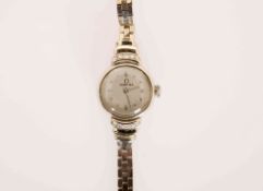 AN OMEGA WHITE GOLD AND DIAMOND LADY'S WRISTWATCH, circular case,