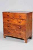 AN EARLY 19TH CENTURY MAHOGANY CHEST OF DRAWERS, with two short over three long graduated drawers,