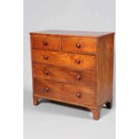 AN EARLY 19TH CENTURY MAHOGANY CHEST OF DRAWERS, with two short over three long graduated drawers,