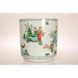 A CHINESE PORCELAIN BRUSH POT, IN KANGXI STYLE, of cylindrical form, painted with figures,