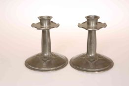 A PAIR OF LIBERTY TUDRIC PEWTER CANDLESTICKS, DESIGNED BY ARCHIBALD KNOX, c.