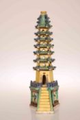 A CHINESE POTTERY MODEL OF A PAGODA, possibly c.