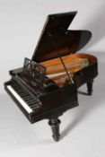 A C. BECHSTEIN EBONISED BABY GRAND PIANO, NO. 34972, raised on faceted legs.