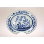 A CHINESE BLUE AND WHITE PORCELAIN BARBER'S BOWL, PROBABLY QIANLONG PERIOD, of oval form,