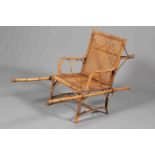 A CHINESE BAMBOO AND RATTAN PALAQUIN CHAIR.