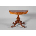 A FINE VICTORIAN BURR WALNUT FOLDOVER DEMILUNE CARD TABLE, CIRCA 1870,