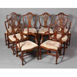 A SET OF EIGHT SHIELD-BACK MAHOGANY DINING CHAIRS, including a pair of carvers,