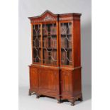 A CHIPPENDALE STYLE MAHOGANY BREAKFRONT BOOKCASE, LATE 19TH/EARLY 20TH CENTURY,