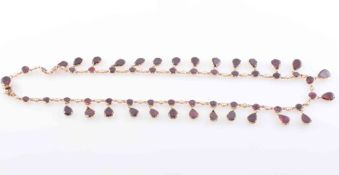 AN EARLY VICTORIAN GARNET AND SEED PEARL NECKLACE,