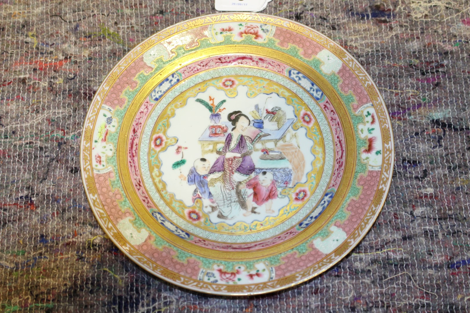 A CHINESE EXPORT FAMILLE ROSE PLATE, painted to the well with a teacher and two boys in an interior. - Image 7 of 7