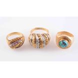 THREE GOLD RINGS, to include a gold and turquoise set ring,