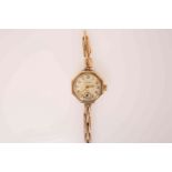 A VINTAGE ROLEX 9 CARAT GOLD LADY'S 9 WRISTWATCH, with octagonal case, signed Rolex and Henderson,