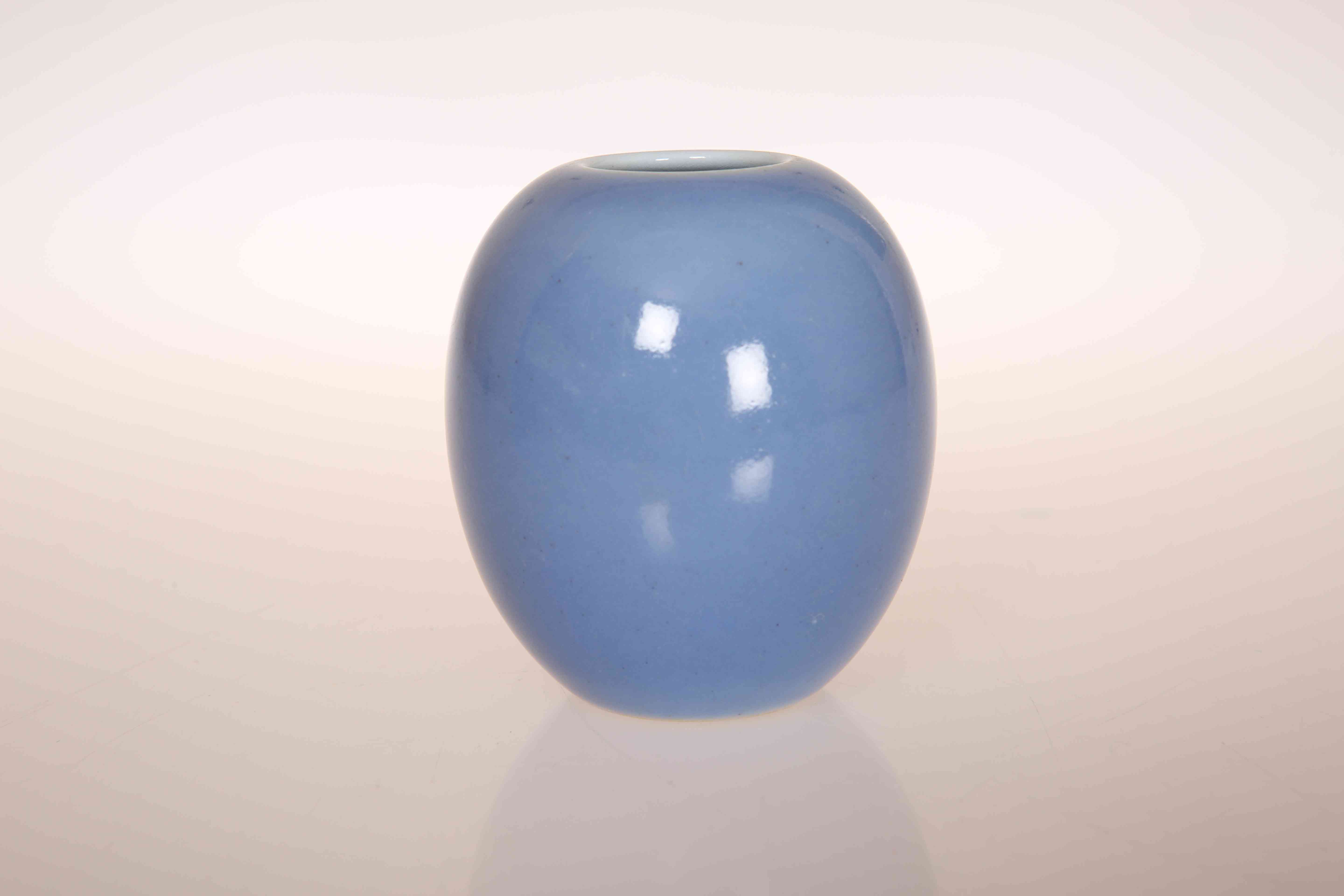 A SMALL CHINESE BLUE GLAZED OVOID VASE, with six character mark within double circles.