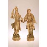 A PAIR OF ERNST WAHLISS, TURN, WIEN BISQUE PORCELAIN FIGURES, of water carriers,
