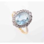 AN AQUAMARINE AND DIAMOND RING,