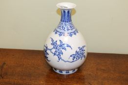 A MING STYLE "BIRD AND FLOWER" YUHUCHUNPING VASE, blue painted with birds on blossoming branches.