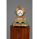 A FRENCH GILT-METAL MANTEL CLOCK, LATE 19TH CENTURY,
