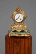 A FRENCH GILT-METAL MANTEL CLOCK, LATE 19TH CENTURY,
