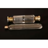 A MID-VICTORIAN SILVER-MOUNTED CUT-GLASS DOUBLE ENDED SCENT BOTTLE,