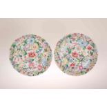 A PAIR OF CHINESE FAMILLE ROSE MILLEFIORE PORCELAIN DISHES, on a white ground,