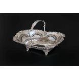 A LATE VICTORIAN SILVER CAKE BASKET, SHEFFIELD 1897, with fixed scroll handle,