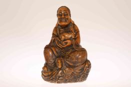 A CHINESE CARVED SOAPSTONE FIGURE OF A SEATED LOHAN,