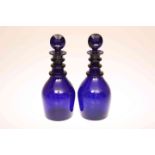 A PAIR OF COBALT BLUE GLASS GIN AND RUM DECANTERS, EARLY 19th CENTURY,
