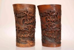 A PAIR OF CHINESE CARVED BAMBOO BRUSH POTS, 19th CENTURY, modelled to resemble tusks,