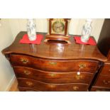 A GEORGE III MAHOGANY SERPENTINE CHEST OF DRAWERS,