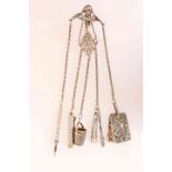 A LATE VICTORIAN SILVER AND WHITE METAL CHATELAINE,