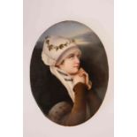 A GERMAN PORCELAIN PLAQUE, LATE 19th CENTURY, oval, painted with a young girl in white bonnet,