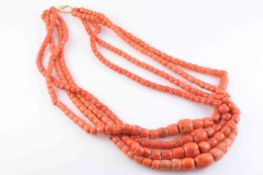 A FOUR ROW CORAL NECKLACE,