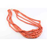 A FOUR ROW CORAL NECKLACE,