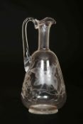 A SMALL STOURBRIDGE ENGRAVED GLASS CLARET JUG, early 19th Century, with panelled neck,