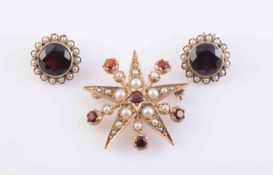 A GARNET AND SEED PEARL BROOCH, circa 1890-1900, formed as a five-pointed star,