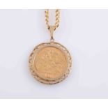 AN EDWARDIAN HALF SOVEREIGN, 1911, in a pendant mount with a chain stamped 375. Gross 10.