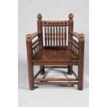 AN OAK TURNERS CHAIR, 19TH CENTURY, with boarded seat.