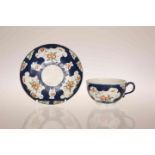 A WORCESTER SCALE BLUE GROUND CUP AND SAUCER, CIRCA 1770,